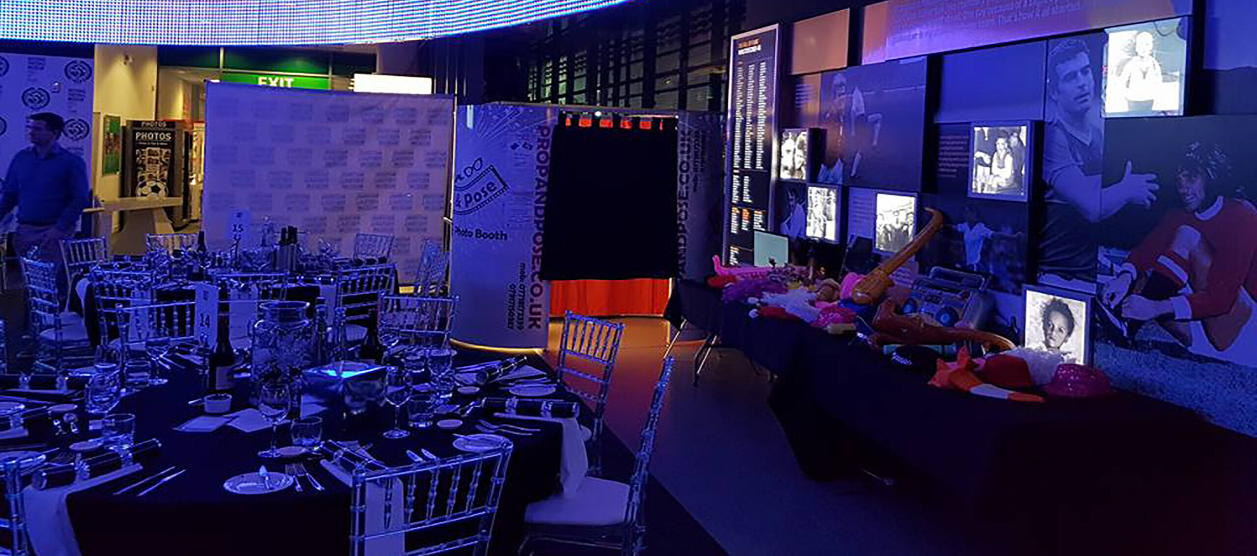 Elegant event setup with a Prop and Pose photo booth.